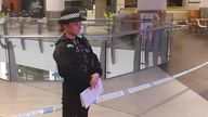 An officer guards a police cordon at Lakeside Shopping Centre in Thurrock, Essex. Pic: Essex Police