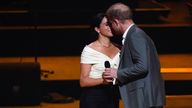 The Duke and Duchess of Sussex kiss during the Invictus Games opening ceremony at Zuiderpark the Hague, Netherlands