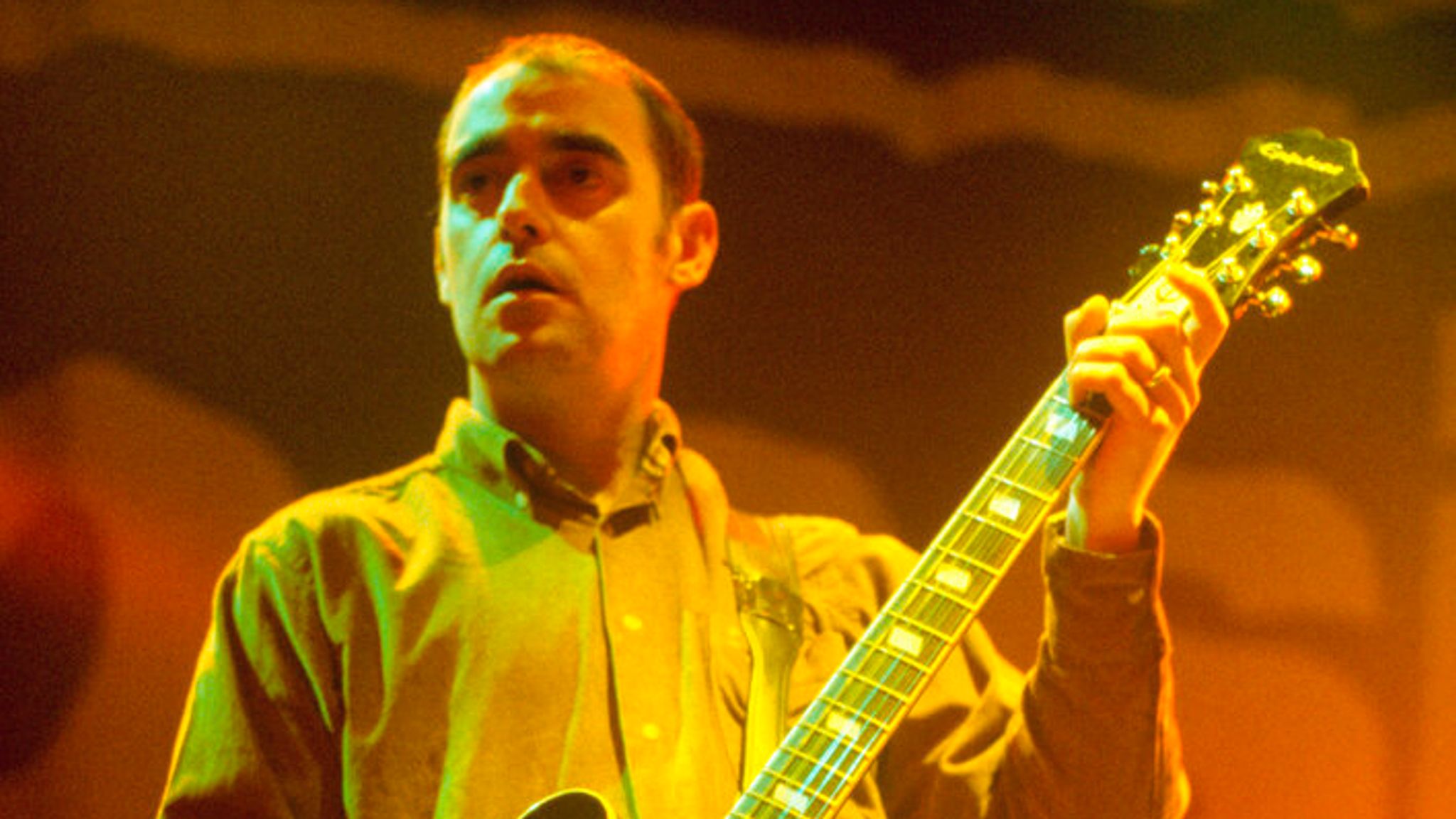Oasis: Guitarist Bonehead diagnosed with tonsil cancer | Ents & Arts News | Sky News