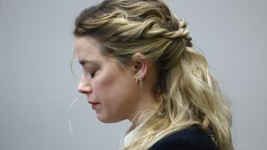 Actor Amber Heard reacts during the 50 million US dollar Depp vs Heard defamation trial at the Fairfax County Circuit Court in Fairfax, Virginia, U.S., April 21, 2022. Jim Lo Scalzo/Pool via REUTERS 