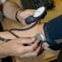 File photo dated 10/09/14 of a doctor checking a patient&#39;s blood pressure. High blood pressure could be treated with an injection every six months instead of a daily tablet as part of a new trial into the condition.