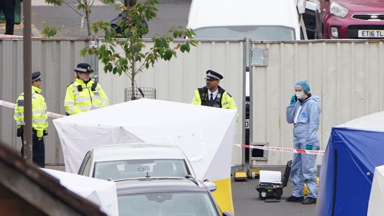 Police forensic tents outside a house in Bermondsey, south-east London, after three women and a man were stabbed to death in the early hours of Monday. Picture date: Monday April 25, 2022.