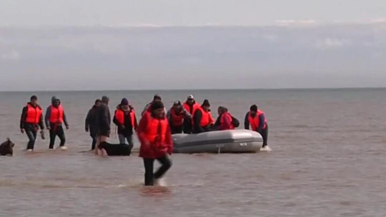 Two groups of migrants can be seen entering the UK by boat in Dover and Lydd in Kent. 