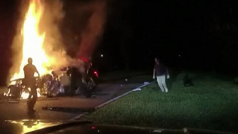 Florida deputies received a 911 that described a car crash and that a man was believed to be trapped inside a burning car. 