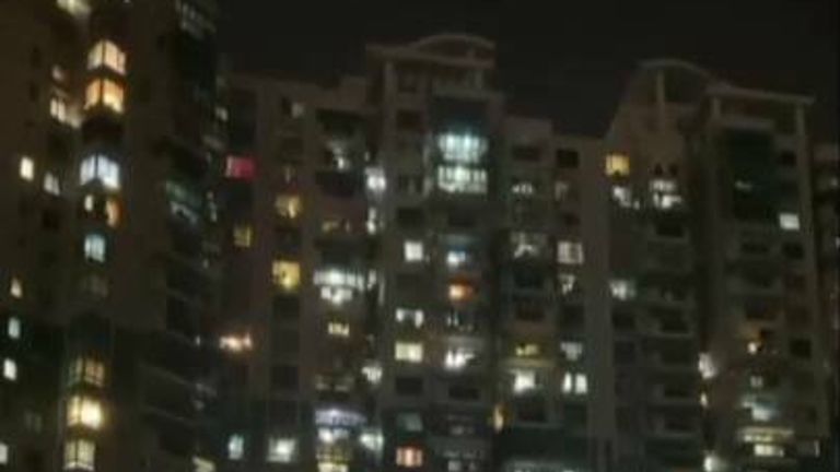 Shanghai residents shout from windows