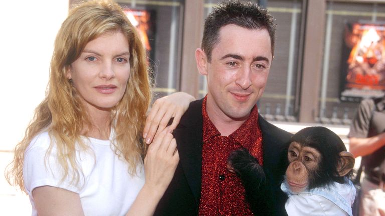 Rene Russo (left), Alan Cumming and a chimpanzee at Buddy film premiere, 1997.Pic: Rex features