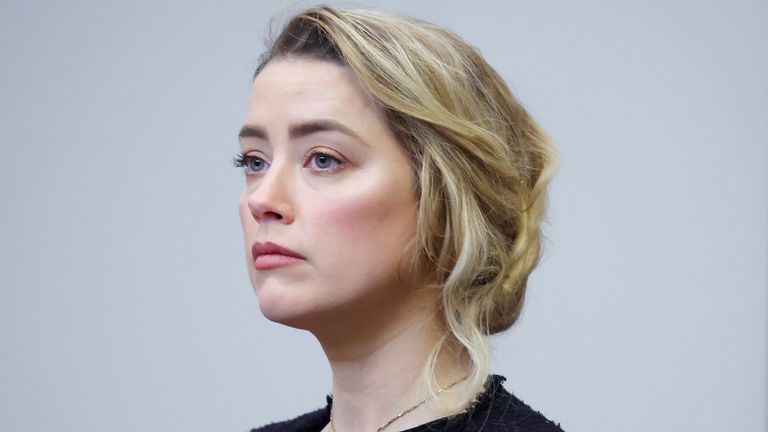 Amber Heard arrives at the start of the day during the Johnny Depp defamation case against ex-wife Amber Heard at the Fairfax County Circuit Courthouse in Fairfax, Virginia, U.S., April 28, 2022. Michael Reynolds/Pool via REUTERS

