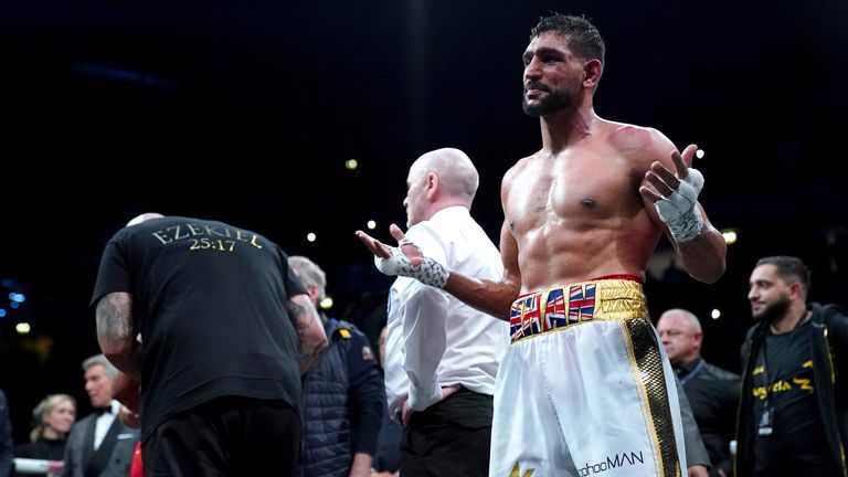 Amir Khan reacts after losing the Welterweight Contest fight against Kell Brook at the AO Arena, Manchester. Picture date: Saturday February 19, 2022.g