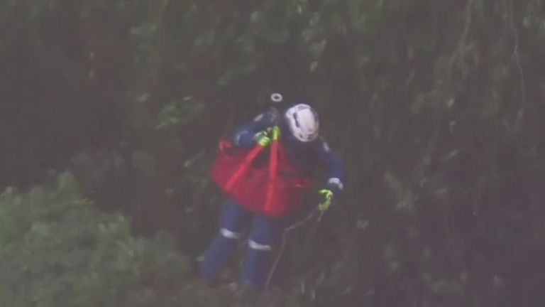 Father and son killed in landslide | World News | Sky News