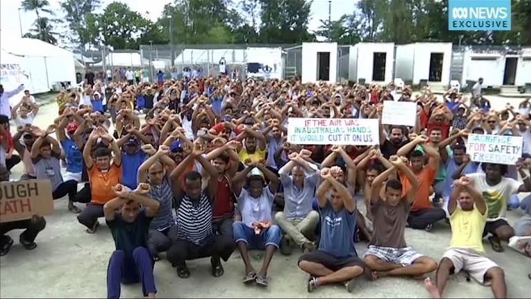 A protest by refugees at the Manus Island camp in Papua New Guinea prior to its closure Pic: AP