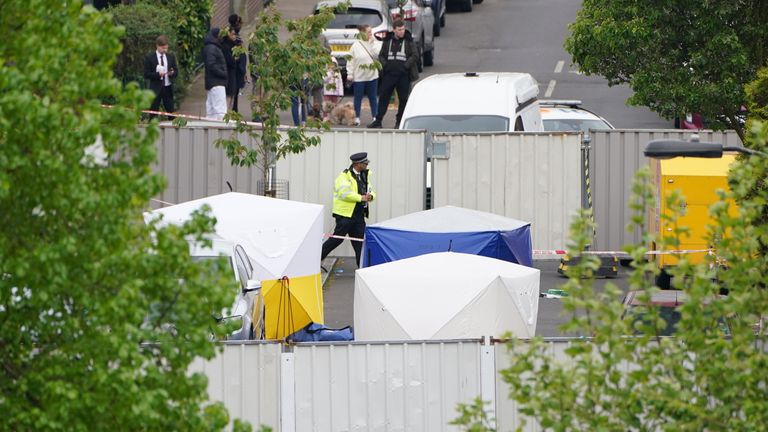 Police forensic tents outside a house in Bermondsey, south-east London, after three women and a man were stabbed to death in the early hours of Monday. Picture date: Monday April 25, 2022.

