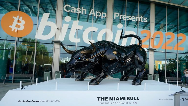 A 3,000lbs statue of a bull was unveiled on the first day of the conference. Pic: AP