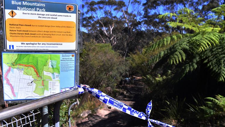 On Tuesday, April 5, 2022, in Wentworth Falls, in the Blue Mountains west of Sydney, where a landslide killed two people, injured two, and was swept away by a landslide. A family of five British people fell into a landslide while walking. Australian Blue Mountains, father and 9-year-old son have died. (Dean Lewins / AAP image via AP) PIC: AP: