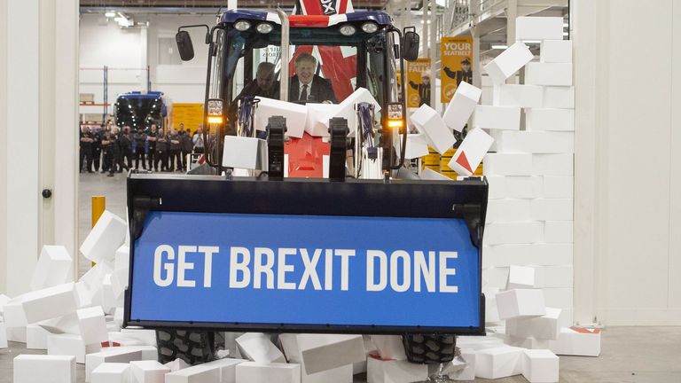 Boris Johnson drove a bulldozer with his election slogan on it as a stunt during the 2019 campaign