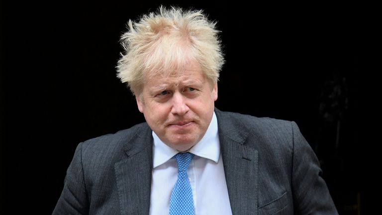 British Prime Minister Boris Johnson walks outside Downing Street in London, Britain, April 27, 2022. REUTERS/Toby Melville
