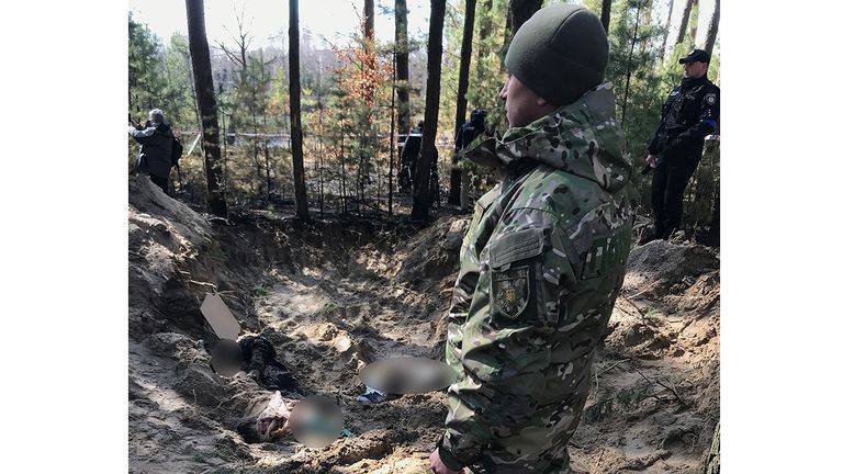 Bodies discovered in a mass grave in Motyzhyn, 25 miles south of Bucha