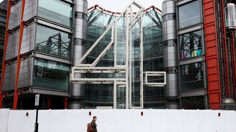 A man walks by Channel 4 Television studios in London, after the government decided to privatise the publicly-owned broadcaster, in London, Britain, April 5, 2022. REUTERS/Tom Nicholson
