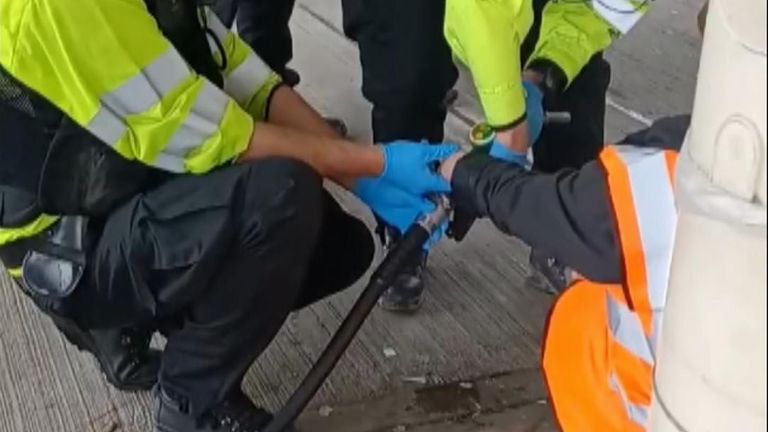 At least 20 people were arrested after climate activists descended on two petrol stations around London. Police had to unglue demonstrators from pumps at Clacket Lane and Cobham services before they could be arrested.