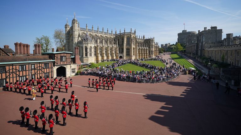 The Band of the Coldstream Guards (top left), play Happy Birthday to mark the 96th birthday of Queen Elizabeth II, alongside the 1st Battalion of the Coldstream Guards during Changing the Guard at Windsor Castle. Picture date: Thursday April 21, 2022.