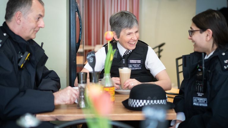 Embargoed to 1700 Friday April 8 Metropolitan Police Commissioner Dame Cressida Dick (centre) visits a cafe during a patrol with local officers in Chingford, Essex, ahead of her last day as chief of the Met on April 10. Picture date: Thursday April 7, 2022.
