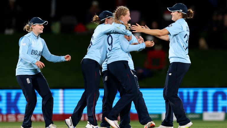 England...s Sophie Ecclestone, second right, celebrates with teammates their win over South Africa in their semifinal of the Women...s Cricket World Cup cricket match in Christchurch, New Zealand, Thursday, March 31, 2022. (Martin Hunter/Photosport via AP)              