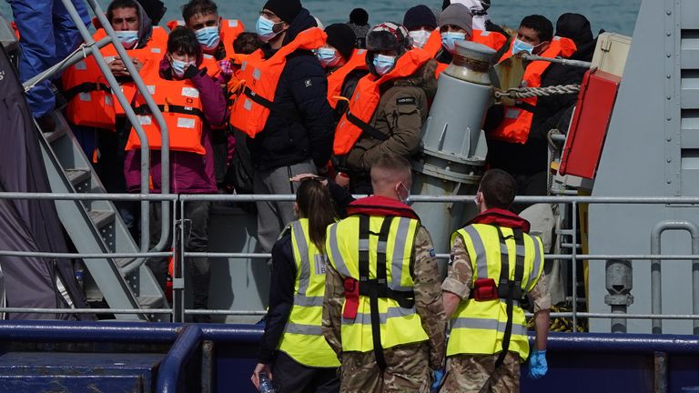 A group of people thought to be migrants are brought in to Dover, Kent, by the RNLI, following a small boat incident in the Channel. Picture date: Thursday April 14, 2022.
