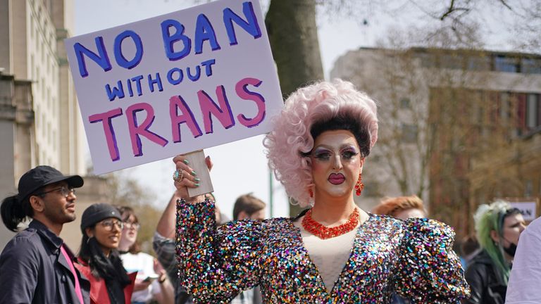 People take part in a protest outside Downing Street in London, over transgender people not being included in plans to ban conversion therapy. Picture date: Sunday April 10, 2022.