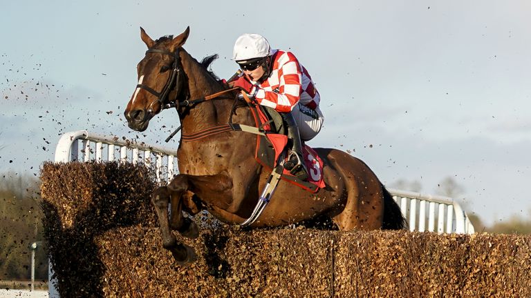 Tom Bellamy riding Eclair Surf on their way to winning The Littleworth Handicap Chase at Sandown Park Racecourse, Esher. Picture date: Thursday February 18, 2021.