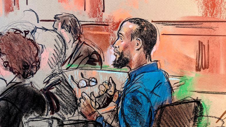 El Shafee Elsheikh, a former British national accused of engaging in lethal hostage-taking and conspiracy to commit murder as an alleged member of an Islamic State cell nicknamed "the Beatles" that operated in Syria and Iraq, takes off his face mask and glasses for identification purposes as he attends testimony in his trial in U.S. federal court in Alexandria, Virginia, U.S. April 1, 2022. REUTERS/Bill Hennessy NO RESALES. NO ARCHIVES. WASHINGTON POST OUT. WASHINGTON, D.C. OUT.
