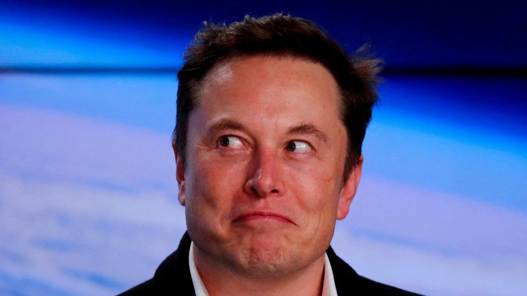 FILE PHOTO: SpaceX founder Elon Musk reacts during a post-launch press conference after a SpaceX Falcon 9 rocket carrying the Crew Dragon spacecraft took off from the Kennedy Space Center in Cape Canaveral, Florida, to the International Space Station unmanned test flight, USA, March 2, 2019. REUTERS/Mike Blake/File photo