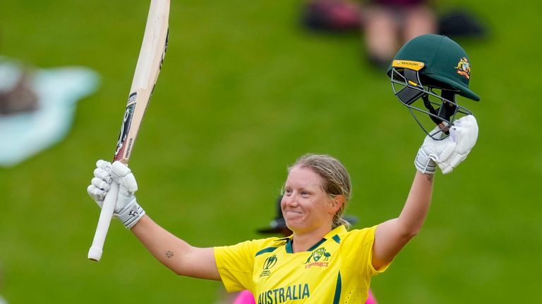 Alyssa Healy of Australia celebrates making 100 runs against the West Indies during their semifinal match of the Women&#39;s Cricket World Cup between Australia and West Indies in Wellington, New Zealand, Wednesday, March 30, 2022. (John Cowpland/Photosport via AP)


