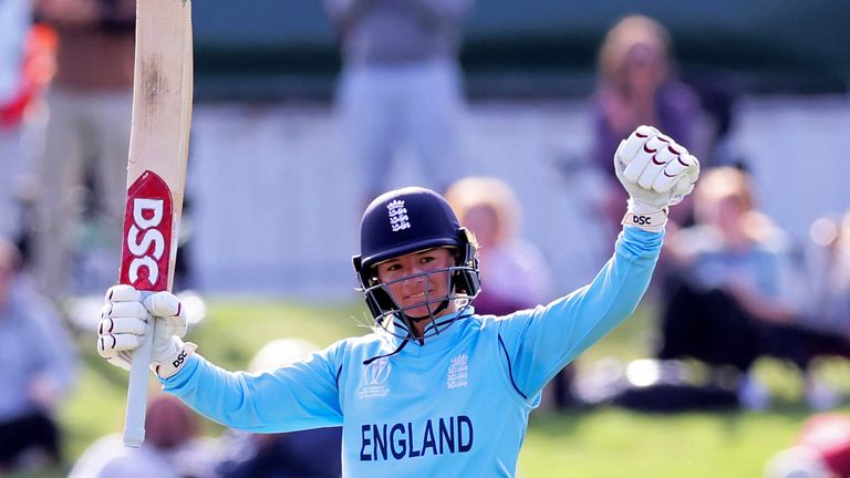 England...s Danielle Wyatt celebrates making 100 runs against South Africa during their semifinal of the Women...s Cricket World Cup cricket match in Christchurch, New Zealand, Thursday, March 31, 2022. (Martin Hunter/Photosport via AP)                   