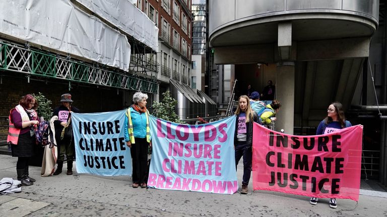 Extinction Rebellion handout photo of climate protesters at the headquarters of Lloyd’s of London, London. Picture date: Tuesday April 12, 2022.
