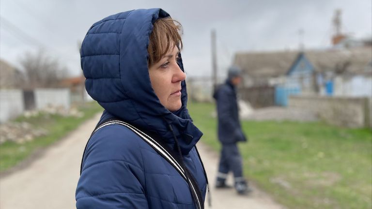 Oxyana Human looks at her bombed home