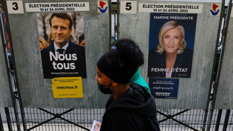 Emmanuel Macron&#39;s &#39;all of us&#39; poster next to Marine Le Pen&#39;s feminist play on &#39;coup d&#39;etat&#39;