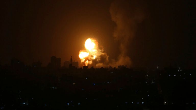 An explosion is caused by Israeli airstrikes on a Hamas military base in the town of Khan Younis, southern Gaza Strip