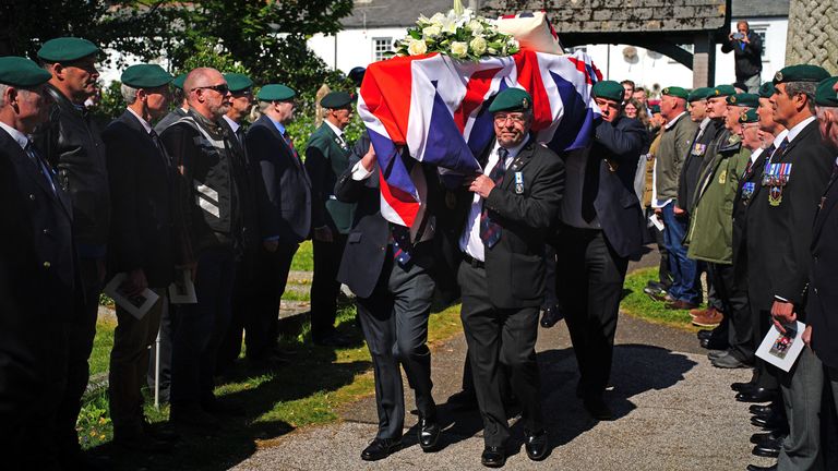 The coffin of 96-year-old World War II serviceman and Royal British Legion fundraiser Harry Billinge is carried into St Paul&#39;s Church in Charlestown, Cornwall. Harry was just 18 when he was one of the first British soldiers to land on Gold Beach during the Battle for Normandy and was one of only four survivors from his unit. Picture date: Tuesday April 26, 2022.
