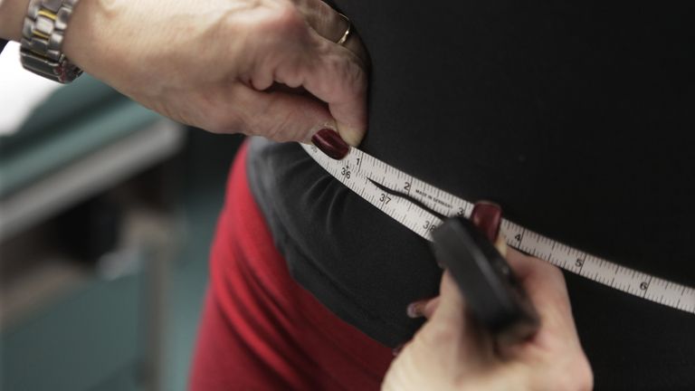 People should ensure their waist measurement is less than half their height to reduce the risk of potential health problems, an NHS watchdog has warned. Pic: AP