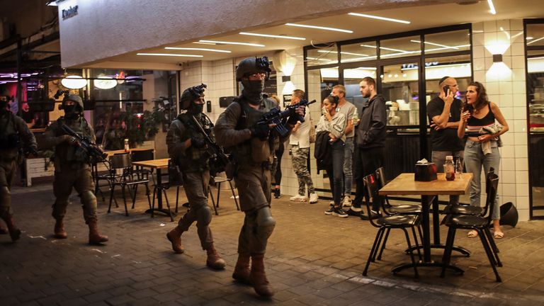 07 April 2022, Israel, Tel Aviv: Israeli security forces search for shooters after a suspected terror attack on Dizengoff Street in central Tel Aviv. At least two people dead and 12 injured in a shooting attack in Tel Aviv&#39;s busy central shopping street. Photo by: Ilia Yefimovich/picture-alliance/dpa/AP Images
PIC:AP

