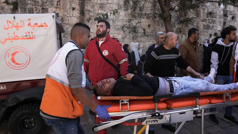 Medics evacuate an injured Palestinian man. Pic: AP