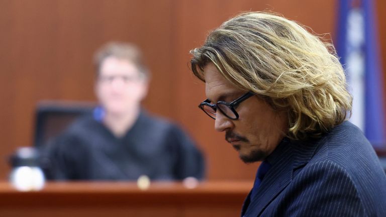 Actor Johnny Depp attends his defamation trial against his ex-wife Amber Heard at the Fairfax County Circuit Courthouse in Fairfax, Virginia, U.S., April 13, 2022. REUTERS/Evelyn Hockstein/Pool
