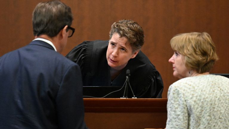 Judge Penney Azcarate speaks to the attorney for actor Johnny Depp, Ben Chew, and attorney for actor Amber Heard, Elaine Bredehoft, during the libel trial in Virginia