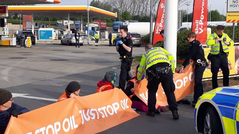 Just Stop Oil protest
Handout photo issued by Just Stop Oil of campaigners staging a protest in the Shell petrol garage at the Cobham Services on the M25 in Cobham, Surrey. Picture date: Thursday April 28, 2022.