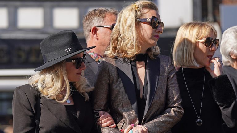 Kelsey Parker (centre) at the funeral of her husband and The Wanted star Tom Parker at St Francis of Assisi church in Queensway, Petts Wood, in south-east London, following his death at the age of 33 last month, 17 months after being diagnosed with an inoperable brain tumour. Picture date: Wednesday April 20, 2022.
