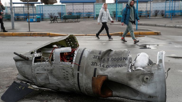 People walk past the remains of a missile at a bus terminal, as Russia&#39;s invasion of Ukraine continues, in Kyiv, Ukraine March 4, 2022. REUTERS/Valentyn Ogirenko