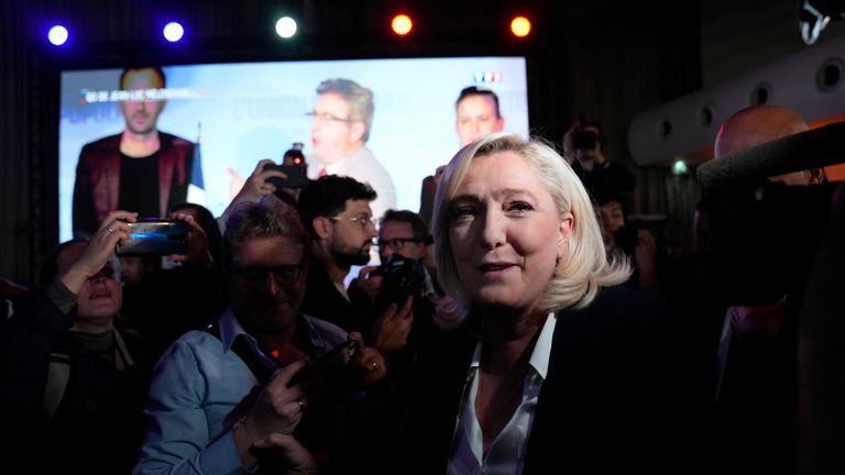 French far-right candidate Marine Le Pen leaves after delivering a speech at her election day headquarters in Paris, Sunday, April 10, 2022. French polling agency projections show incumbent French President Emmanuel Macron and far-right leader Marine Le Pen leading in the first round of France&#39;s presidential election Sunday. (AP Photo/Francois Mori)