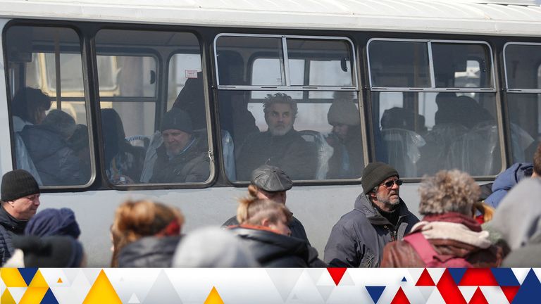 Refugees board trains to escape Ukraine in Mariupol