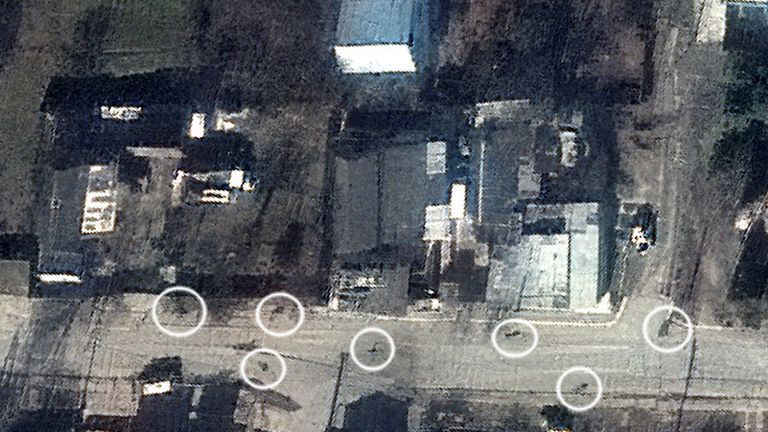 Close up of Maxar Satellite image of Yablonska Street, in Bucha. Ukraine  Circled image are believed to be bodies in the street. Image date March 19 2020
Credit:MAXAR/REUTERS