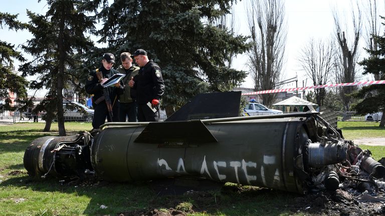 Ukrainian servicemen stand next to a fragment of a Tochka-U missile with a writing in Russian "For children" , on a grass after Russian shelling at the railway station in Kramatorsk, Ukraine, Friday, April 8, 2022. (AP Photo/Andriy Andriyenko)
PIC:AP

