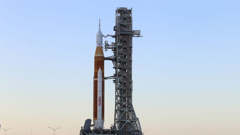 NASA&#39;s next-generation moon rocket, the Space Launch System (SLS) rocket with its Orion crew capsule perched on top, makes a highly anticipated, slow-motion journey from the Vehicle Assembly Building (VAB) to its launch pad at Cape Canaveral, Florida, U.S. March 17, 2022. REUTERS/Thom Baur
